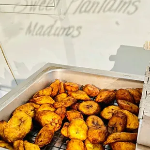 a tray full of fried bananas