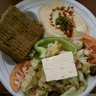 Baked kibbeh, hummus, and salad