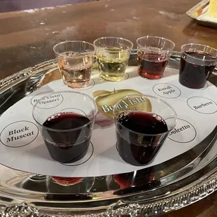 a variety of wines on a tray