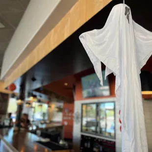 an umbrella hanging from the ceiling