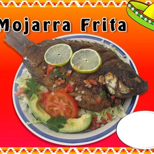 a plate of fish and vegetables