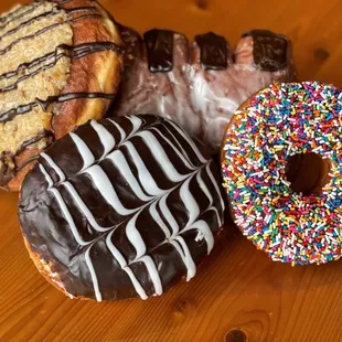 a variety of donuts on a table