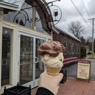 Double scoop ice cream. Chocolate and Peanut Butter on top, Mackinaw Island Fudge on bottom.