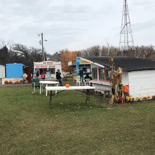 Farm2 food trucks reasonable $5 burger/dog and less for fries. Also donuts $5 bag or for 10-14 refillable mini tubs