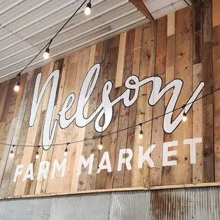 a sign for nelson farm market