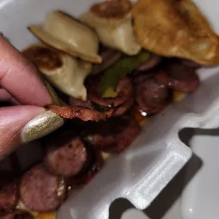 Sausage and peppers with pierogi
