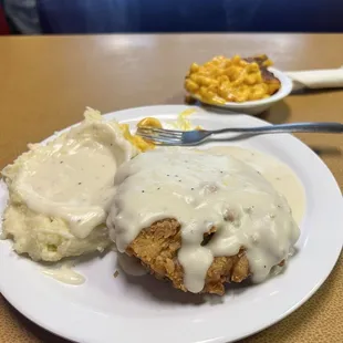 Chicken fried steak, mashed potatoes, macaroni and cheese