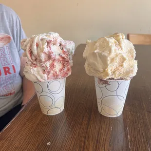 On left: white chocolate raspberry truffle ice cream- kids cup On Right: banana ice and chocolate raspberry-kids cup