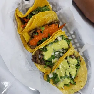 Asada Tacos try it with our mild green avocado sauce or spicy red sauce.