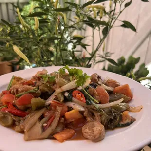 Large intestine stirfried with pickled mustard leaves