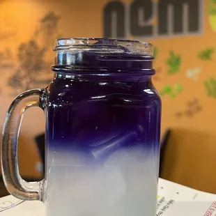 Butterfly pea flowers with young coconut juice