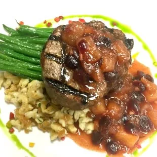 Filet Mignon over Spaetzle topped with a Pear-Cranberry Chutney