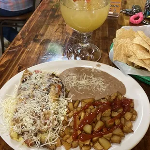 Breakfast omelette, potatoes &amp; refried beans