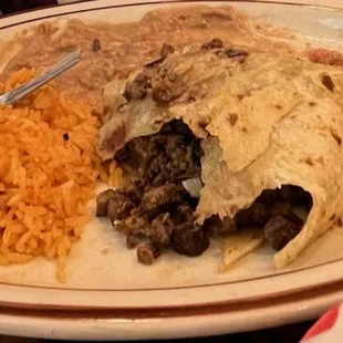 Sloppily served carne asada burrito.