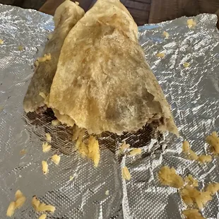 My sons half eaten carne asada burrito