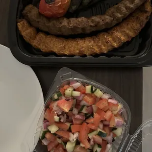 a plate of meat and vegetables