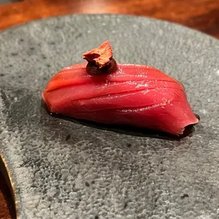 Akami- lean bluefin tuna topped with freeze dried strawberry