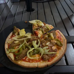 10&quot; 4 Topper Pizza gluten-free crust on pizza and vegan cheese and vegan sausage