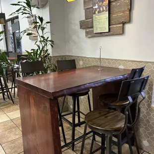 a table and chairs in a restaurant