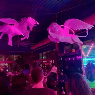 a group of people at a bar