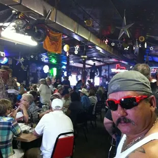 a man in sunglasses and a bandana