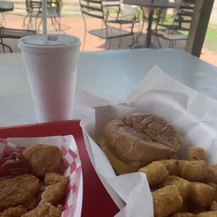 Cheeseburger with tots and chicken nuggets