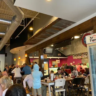 a large group of people in a restaurant