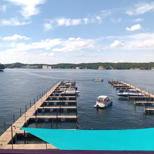 a dock with several boats in the water