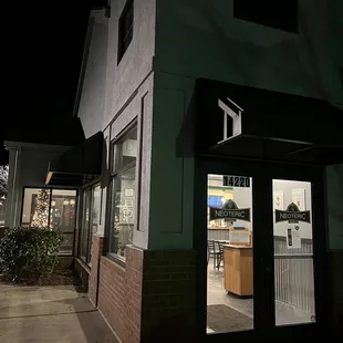 the outside of a building at night