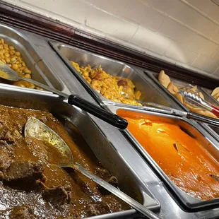 a variety of food items in a buffet