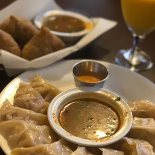 Chicken momo to share.  Great Samosas in the background