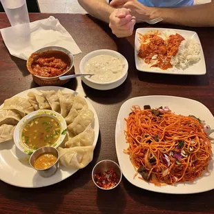 Pork momos, lamb chow mein, chicken rata, yogurt dipping sauce