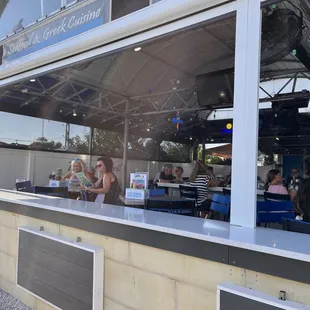 Sidewalk view of the patio seating.