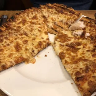 Burned flat pizza.