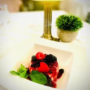 Panna Cotta - $14 Tahitian Vanilla Panna Cotta, Wild Berry Coulis Very good