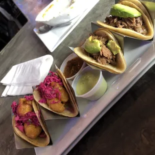Fish tacos &amp; brisket tacos with corn tortillas.