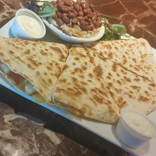 Customize your Quesadilla, served with Rice and Beans