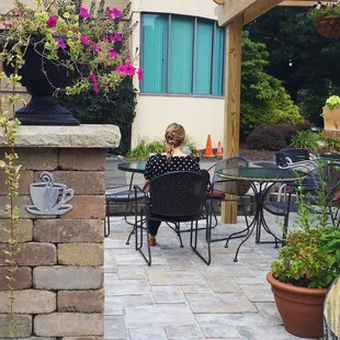 Part of the lovely outdoor patio, much more seating to the right.