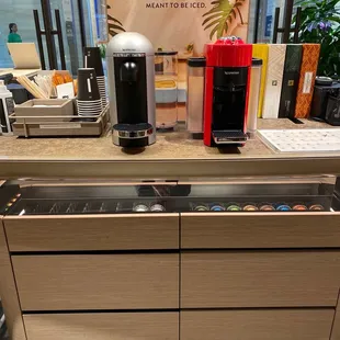 a display of nespresso coffee machines