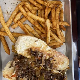 french fries and a steak sandwich