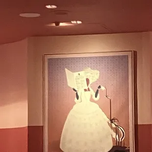Make sure to look at the portraits on the wall. They&apos;re all of characters from Netflix shows. This one is of Queen Charlotte.