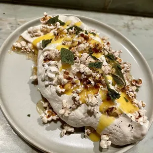 Popcorn pavlova with passion fruit