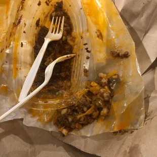 Chili cheese dog no bun. Was supposed to be no onion, clearly was not no onion.