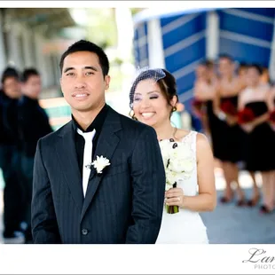 She taps him on his shoulder to let him know she&apos;s there...Photo by L&apos;Amour Photography.