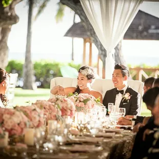 Fun times at the head table!  Flowers by Passion Roots.  Linen and sofette by Les Saisons.  Photo by Frank J. Lee Photography.