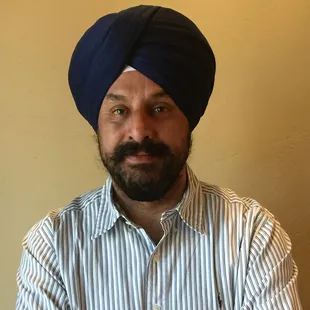Dr Perminder Bhatia