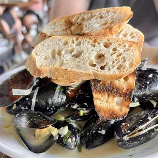 White wine and leeks with mussels. We ordered extra bread to sop up the remaining broth.