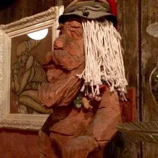 This awesome wooden carving can be found at the end of the bar!