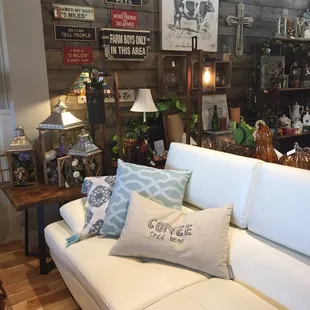 a living room with a white couch