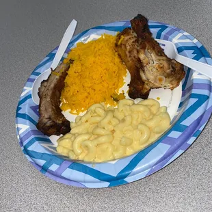 Ribs, chicken, Mac and cheese, and saffron rice